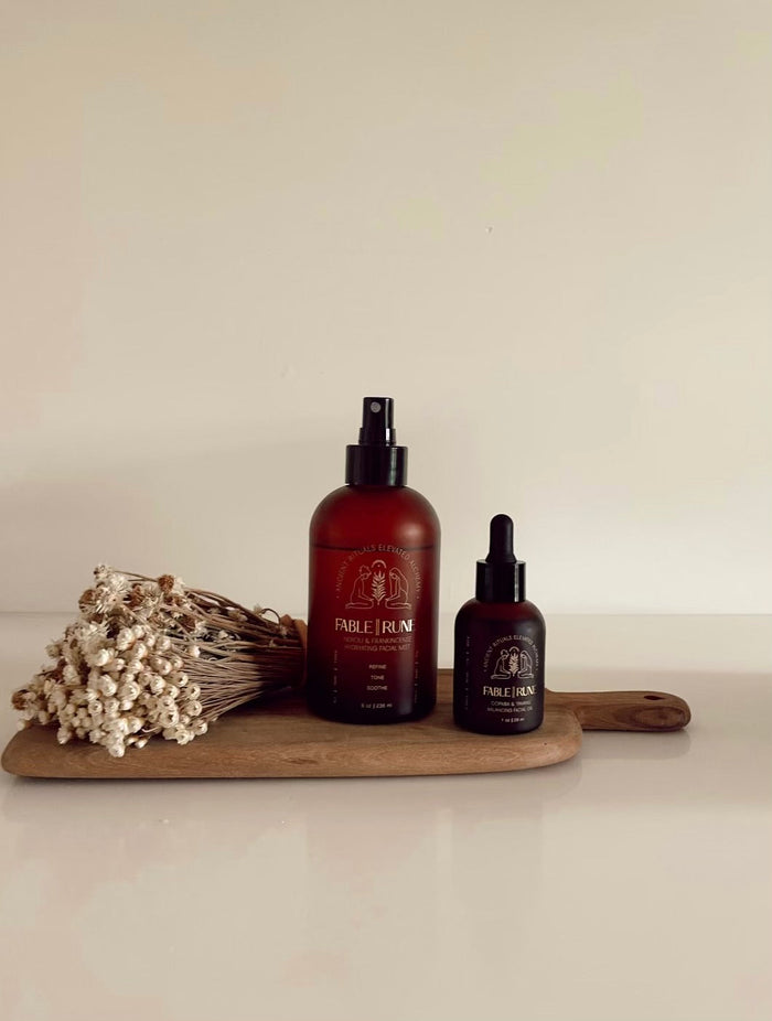 face mist and face oil on cutting board