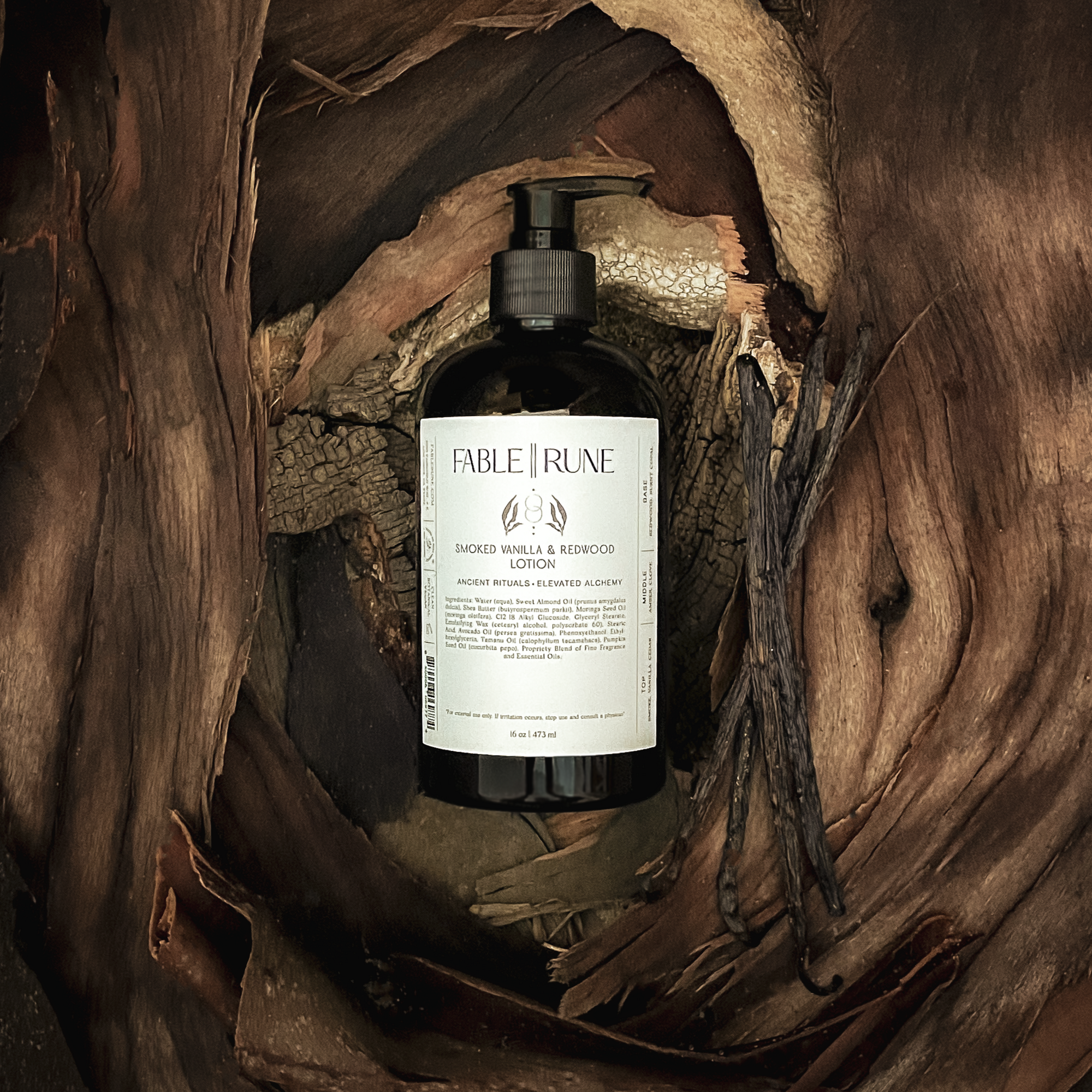 smoked vanilla redwood lotion bottle in a wooden setting