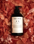 Body Lotion bottle on a bed of dried grapefruit rinds